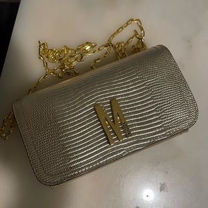 Brand new gold Moschino clutch purse with gold chain